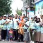 Warga RW 09 Perumahan Selong Permai, Kelurahan Gunung Sekar, Kecamatan/Kabupaten Sampang antusias mengikuti rangkaian peresmian Kampoeng PLN Mobile. (MUKSIN IKSAN / KLIKMADURA).