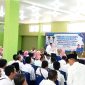 Ratusan guru PPPK hadir dalam kegiatan penandatanganan perpanjangan kontrak di aula BKPSDM Sampang, Selasa (25/3/2025).
