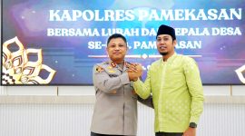 Kapolres Pamekasan AKBP Hendra Eko Triyulianto bersama Ketua Persatuan Kepala Desa (Perkasa) Pamekasan Farid Afandi. (DOK. KLIKMADURA)