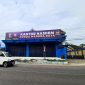 Pengendara melintas di depan Kantor NasDem Korda Madura Raya di Jalan Lingkar Barat, Desa Babbalan, Kecamatan Batuan, Sumenep, Jawa Timur. (DOK. KLIKMADURA)