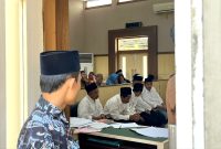 Lima terdakwa kasus dugaan sabotase Pilkades PAW Desa Gugul, Kecamatan Tlanakan saat mengikuti sidang tuntutan di PN Pamekasan. (MOH. IQBALUL KHAVEI MZ / KLIKMADURA)