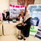LAYANAN TERBAIK: Petugas stand RSUD Smart Pamekasan foto bersama di area pameran kesehatan Rakerkes Dinkes Pamekasan. (RSUD SMART UNTUK KLIK MADURA)