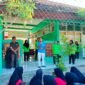 Kepala Dinkes Pamekasan dr. Saifudin memberikan sambutan pada kegiatan aksi bergizi di SMPN 3 Pademawu. (LAILIYATUN NURIYAH / KLIKMADURA)