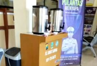 Stand ngopi gratis di Samsat Sampang. (ISTIMEWA)