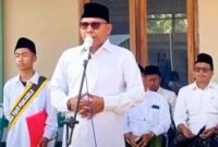 Pengasuh PPMU Al-Hasani, KH. Aliyadi Mustofa saat menyampaikan sambutan pada peringatan HSN 2025.