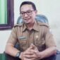 Kepala Bidang Jaminan Sosial (Jamsos) Dinas Sosial Pemberdayaan Perempuan dan Perlindungan Anak (Dinsos PPPA) Kabupaten Sampang, Erwin Elmi Syahrial. (DOK. KLIKMADURA)