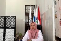 Kepala SRMP 29 Pamekasan Aisyah Minarni Mukti saat ditemui di ruang kerjanya (LAILIYATUN NURIYAH/KLIK MADURA).