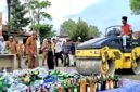 Bupati Pamekasan Dr. KH. Kholilurrahman bersama Forkopimda saat memusnahkan ribuan botol miras di depan Mandhapa Agung Ronggosukowati. (MOH. IQBALUL KHAVEI MZ / KLIKMADURA)