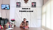 Kepala SMAN 2 Pamekasan, Moh. Arifin saat ditemui di kantornya. (LAILIYATUN NURIAH / KLIKMADURA)