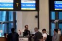 Petugas Imigrasi melayani warga di salah satu bandara. (DOK. KLIKMADURA)