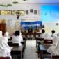 Kepala SMAN 3 Pamekasan, Wardi (tengah) saat menyampaikan sambutan pada pembukaan BTS. (YUSRIL RAHMAN SYAKUR / KLIKMADURA)
