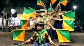 Siswa-siswi Sekolah Dasar Muhammadiyah 2 Socah (SD MUDABA) Bangkalan beratraksi Pramuka. (NUR FITRIA / KLIKMADURA)