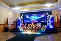 Ketua Pelaksana PGSD Festival 2026, Husnil saat menyampaikan sambutan. (NUR FITRIA / KLIKMADURA)