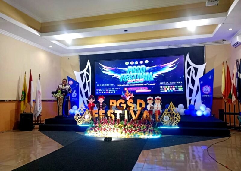 Ketua Pelaksana PGSD Festival 2026, Husnil saat menyampaikan sambutan. (NUR FITRIA / KLIKMADURA)