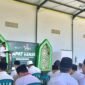 Ketua PCNU Sumenep KH. Md Widadi Rahim menyampaikan sambutan saat pembukaan Raker di Ponpes At-Taufiqiyah, Desa Aengbaja Raja, Kecamatan Bluto, Kabuoaten Sumenep. (PRENGKI WIRANANDA / KLIKMADURA)
