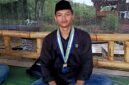 Kiromuddin, mahasiswa sekaligus petani muda asal Desa Prancak, Kecamatan Pasongsongan. (KLIKMADURA)
