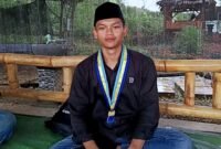 Kiromuddin, mahasiswa sekaligus petani muda asal Desa Prancak, Kecamatan Pasongsongan. (KLIKMADURA)