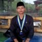 Kiromuddin, mahasiswa sekaligus petani muda asal Desa Prancak, Kecamatan Pasongsongan. (KLIKMADURA)