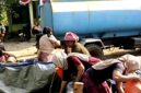 Warga Desa Larlar, Kecamatan Banyuates, Sampang saat mengambil air bersih menggunakan deriken. (ALI MUCHTAR / KLIKMADURA)