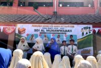 Kepala SDI Al-Munawwarah Pamekasan Dedeh Rosidah menyampaikan sambutan saat pemilihan OSSDA. (KLIKMADURA)