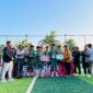 Ketua KSMI Pamekasan, Mahfud (jas hitam) bersama tamu undangan usai menyerahkan trophi kepada tim MAN 2 Pamekasan yang keluar sebagai Juara 1 Kejurkab KSMI Pamekasan di lapangan Puri Dewata Mini Soccer (PDMS) Pamekasan. (KLIKMADURA)