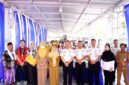 Perwakilan Lapas Narkotika Kelas II-A Pamekasan foto bersama tim medis dan warga binaan menjelang skrining. (KLIKMADURA)
